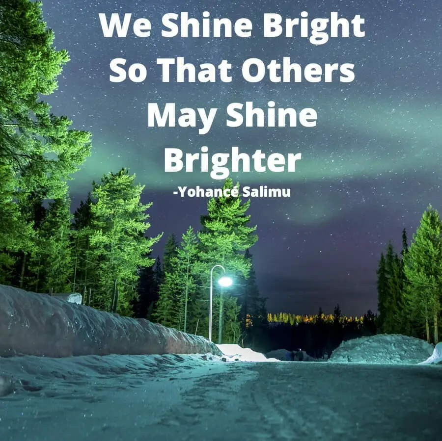 positive quote about shining bright for others with beautiful natural aurora borealis night sky in winter night.